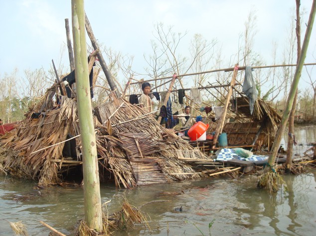 Bamboo homes destroyed by Cyclone Nargis in the Irrawaddy Delta