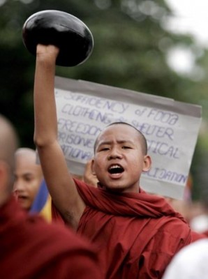 A-young-monk-holds-his-alms-bowl-upside-down-during-the-2007-uprising_medium_thumb